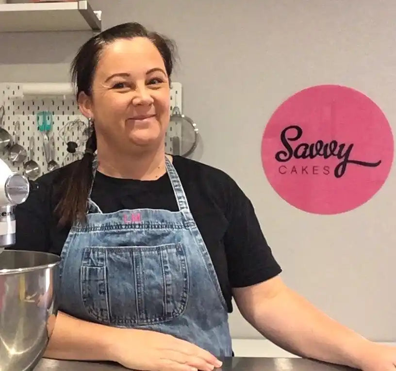Woman wearing denim apron.